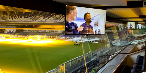 Contoh Penerapan Digital Signage pada Kursi VIP di Stadion Sepak Bola